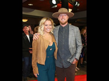Calgary Stampeder Bo Levi Mitchell and his wife Madison arrive on the red carpet at the Canadian Country Music Awards at the Saddledome in Calgary Sunday, September 8, 2019. Jim Wells/Postmedia