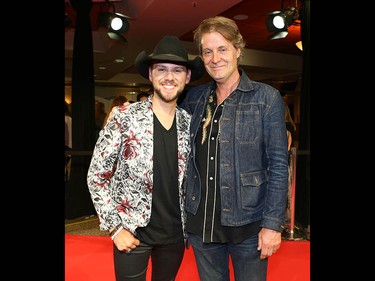 Brett Kissel (L) and Jim Cuddy arrive on the red carpet at the Canadian Country Music Awards at the Saddledome in Calgary Sunday, September 8, 2019. Jim Wells/Postmedia