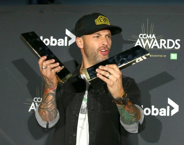 Dallas Smith poses with his awards at the Canadian Country Music Awards at the Saddledome in Calgary Sunday, September 8, 2019. Smith took home the Entertainer of the Year and Male Artist of the Year. Jim Wells/Postmedia
