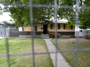 Calgary Police join Alberta Sherrifs close down a house in 2000 blk of  Cottonwood Cr SE in Calgary on  Tuesday, September 17, 2019. It is the second time the same house has been shut down. The Safer Communities and Neighborhoods Unit (SCAN) obtained a warrant to close the house for 90 days and impose strict conditions on the property's use for the next five years. Jim Wells/Postmedia