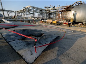 Part of a damaged tank is seen at the Saudi Aramco oil facility in Abqaiq, Saudi Arabia, Sept. 20, 2019.