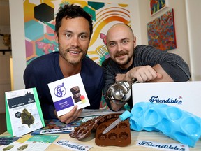 L-R, Evan Mah and Ciprian Georgescu from Friendibles, who send out home kits so people can make their own edibles at home, show what the kits contain at FivePoint Cannabis Bridgeland at 945 Gebneral Ave. N.E. in Calgary on Tuesday, September 10, 2019. Darren Makowichuk/Postmedia