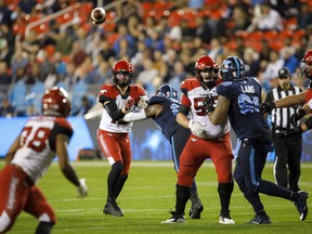Calgary Stampeders quarterback Bo Levi Mitchell (19) throws an incomplete pass during second half of CFL action against the Toronto Argonauts in Toronto, Friday, Sept. 20, 2019. THE CANADIAN PRESS/Cole Burston