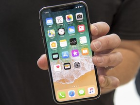 An iPhone X at an Apple Event in 2017. Apple will launch its newest iPhones on Tuesday.