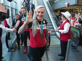 Kaillie Humphries arrives in Calgary after the 2018 Winter Olympics in Pyeongchang.
