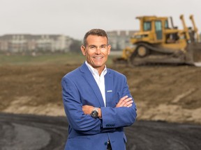 Paul Taylor, president and COO of Hopewell Residential, at the entrance to Arbour Lake West.