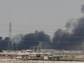 Smoke is seen after the attack on the Aramco facility in the eastern city of Abqaiq, Saudi Arabia on Sept. 14, 2019.