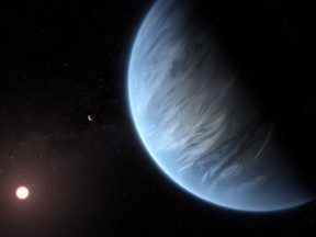 An artist's impression released by NASA on September 11, 2019 shows the planet K2-18b, its host star and an accompanying planet.