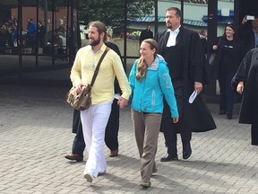 David and Collet Stephan leave court in Lethbridge on Thursday, Sept. 19, 2019, after they were acquitted in the death of their 19-month-old son, Ezekiel.