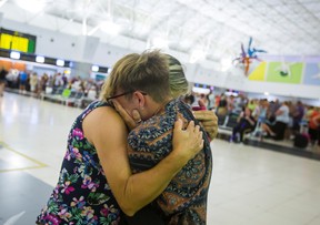 Thomas Cook passengers at Las Palmas Airport, Canary Islands, after the world's oldest travel firm collapsed on Monday, stranding hundreds of thousands of holidaymakers around the globe and sparking the largest peacetime repatriation effort in British history.