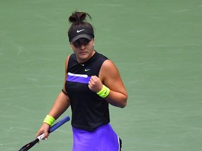 Bianca Andreescu of Canada react after a point against Serena Williams of the US during the Women's Singles Finals match at the 2019 US Open at the USTA Billie Jean King National Tennis Center in New York on September 7, 2019.