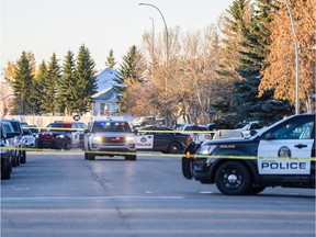 Police are investigating the scene of a home invasion at Monterey Park in Calgary on Thursday, October 10, 2019.
