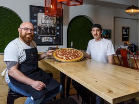 Rob Greco, owner, left, and Reed Vares, chef, at Carmine's Pizza pose for a photo on Thursday, October 17, 2019. Azin Ghaffari/Postmedia Calgary
