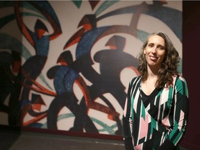 Hana Leaper, curator of new exhibit Sybil Andrew: Art and Life poses at the Glenbow Museum in Calgary on  Wednesday, October 16, 2019. Jim Wells/Postmedia