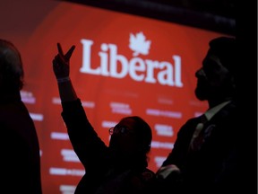 Liberal supporters react as they watch results roll in at Canadian Prime Minister Justin Trudeau's election night headquarters on October 21, 2019.
