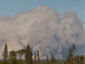 The McMillan Complex wildfire is seen from north of the town of Slave Lake off Highway 88, on Sunday, June 2, 2019.