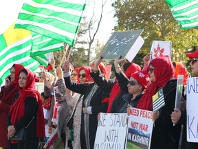 Dozens of supporters gather for Calgary's first all women's rally in solidarity with Kashmir at Prairie Winds Park. Supporters held signs and chanted for freedom for all citizens of Kashmir on Sunday, October 6, 2019. Brendan Miller/Postmedia