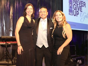 The 22nd Wood's Homes Never Give Up Gala was a success, raising more than $225,000 in support  of the EXIT Youth Hub at Wood's Homes' new Inglewood campus. Pictured, from left: gala co-chairs and Wood's Homes Foundation board members Shannon Glover and Eric Perez with foundation board chair Kata Acheson. Photos courtesy Woods Homes