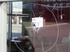 A bullet hole is seen at a Mr. Sub in the 4600 block of Macleod Tr. on  Saturday, October 12, 2019. Zach Laing/Postmedia