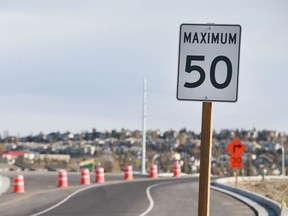 A speed limit sign is on the side of the road exiting the Discovery Ridge neighborhood in southwest Calgary on Saturday, October 19, 2019. Jim Wells/Postmedia