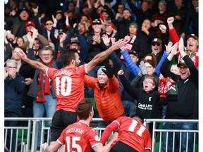 Cavalry FC Sergio Camargo celebrates with fans after a second half goal during CPL soccer action between FC Edmonton and Cavalry FC at ATCO Field at Spruce Meadows in Calgary on Saturday, October 19, 2019. Cavalry won 3-1 and took the fall season. Jim Wells/Postmedia