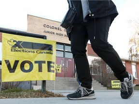 Voters cast their ballots in the 2019 federal election at Colonel Irvine Junior High School in northwest Calgary on Monday, Oct. 21, 2019.