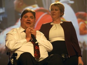Kent Hehr and his wife Deanna during his speech at the Palace Theatre in Calgary on Monday, October 21, 2019.