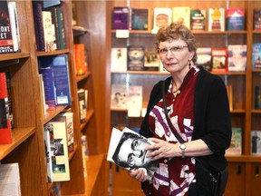 Susan Hare, co-owner of Owl's Nest Books in Britannia Shopping Plaza, poses in the Calgary store on Tuesday, October 29, 2019. The store is having to downsize after more than 20 years in business.