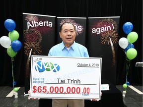 Lottery winner Tai Trinh is presented with a giant cheque at a press conference in Calgary on Thursday, October 31, 2019 where he was introduced as a $65 million LOTTO MAX winner on the October 4 draw. His win is the largest in Alberta history and tied for the largest win in any part of Canada. Jim Wells/Postmedia