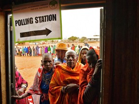 Voting in Canada is much easier and safer than many in Africa endure. Here, Maasai voters queue at a polling station in Saikeri, Kajiado West County.