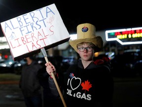 Albertans protest outside a Liberal rally in Calgary during the election. The Liberal minority government, potentially aided by parties hostile to the oilpatch, has already cast a gloom over the country’s energy centre.