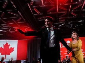 Prime Minister Justin Trudeau and his wife Sophie Gregoire Trudeau react after the federal election at the Palais des Congres in Montreal, Quebec, Canada on Oct. 22, 2019.