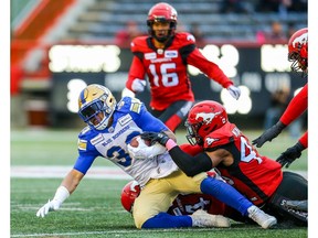Winnipeg Blue Bombers runs the ball against the Calgary Stampeders during CFL football in Calgary on Saturday, October 19, 2019. Al Charest/Postmedia