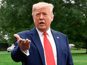 U.S. President Donald Trump speaks to reporters outside the White House on Oct. 3, 2019.