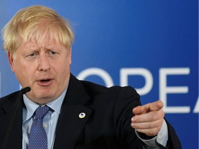 Britain's Prime Minister Boris Johnson speaks during a news conference at the European Union leaders summit dominated by Brexit, in Brussels, Belgium October 17, 2019. REUTERS/Piroschka van de Wouw