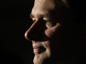 Then-Canadian Prime Minister Designate Stephen Harper pauses for a moment as he addresses the media for the first time since winning the federal election on Parliament Hill on January 26, 2006 in Ottawa.