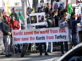 Hundreds of Calgary's Kurdish community came out to rally at City Hall to protest against Turkisk military's occupation of Northern Syria in Calgary on Wednesday, October 9, 2019. Darren Makowichuk/Postmedia