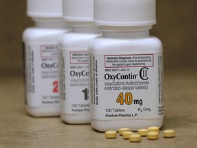 Bottles of prescription painkiller OxyContin pills, made by Purdue Pharma.