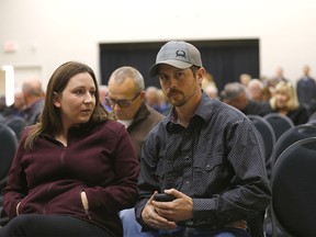 Rancher Eddie and his wife Jessica Maurice were among many who came out for a rural crime town hall meeting with the Hon. Doug Schweitzer Minister of Justice and Solicitor General at the Foothills Centennial Centre in Okotoks on Tuesday, October 1, 2019. Darren Makowichuk/Postmedia