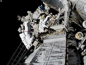 U.S. astronauts Jessica Meir and Christina Koch make the first all-female spacewalk outside the International Space Station in a still image from video October 18, 2019.