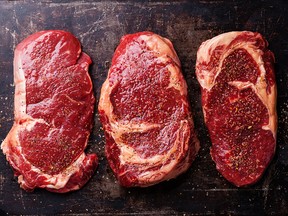 Three cuts of Raw fresh meat Steaks