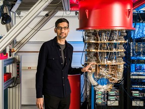 A handout picture from October 2019 shows Sundar Pichai with one of Google's Quantum Computers in the Santa Barbara lab, California.