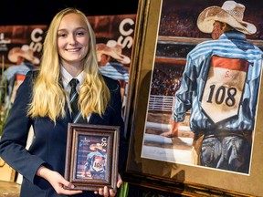 Winner of the 2020 Calgary Stampede poster competition and grade 12 student Ariel Clipperton poses for a photo at the Calgary French & International School.