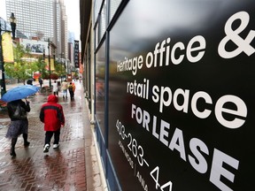 For lease signs advertise space along Stephen Avenue Mall in downtown Calgary.