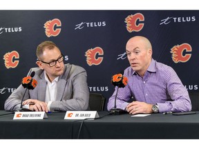 Flames GM Brad Treliving and head physician Dr. Ian Auld update TJ Brodie's condition on Friday morning. Photo by Azin Ghaffari/Postmedia.