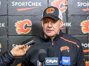Calgary Flames head coach Bill Peters speaks to media on Nov. 15.