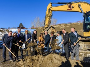 Officials pose during a groundbreaking ceremony at the future site of the Centre for Child and Adolescent Mental Health in Calgary on Friday, Nov. 22.