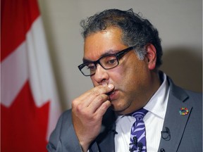 "What we have seen this week is a whole bunch of things coming together at once," Mayor Naheed Nenshi said of announced layoffs.