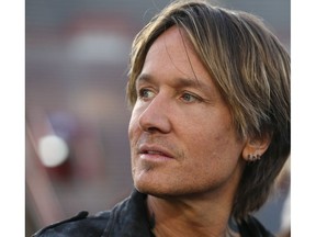 Country music star Keith Urban talks to media in Calgary Saturday, November 23, 2019 at McMahon Stadium. Urban plays at half time during the Grey Cup as The Hamilton Ti Cats take on the Winnipeg Blue Bombers on Sunday. Jim Wells/Postmedia