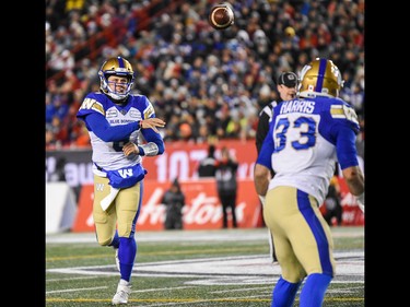 Winnipeg Blue Bombers Zach Collaros passes the ball to Andrew Harris during the Grey Cup CFL championship football game against Hamilton Tiger-Cats on Sunday, November 24, 2019. Azin Ghaffari/Postmedia Calgary